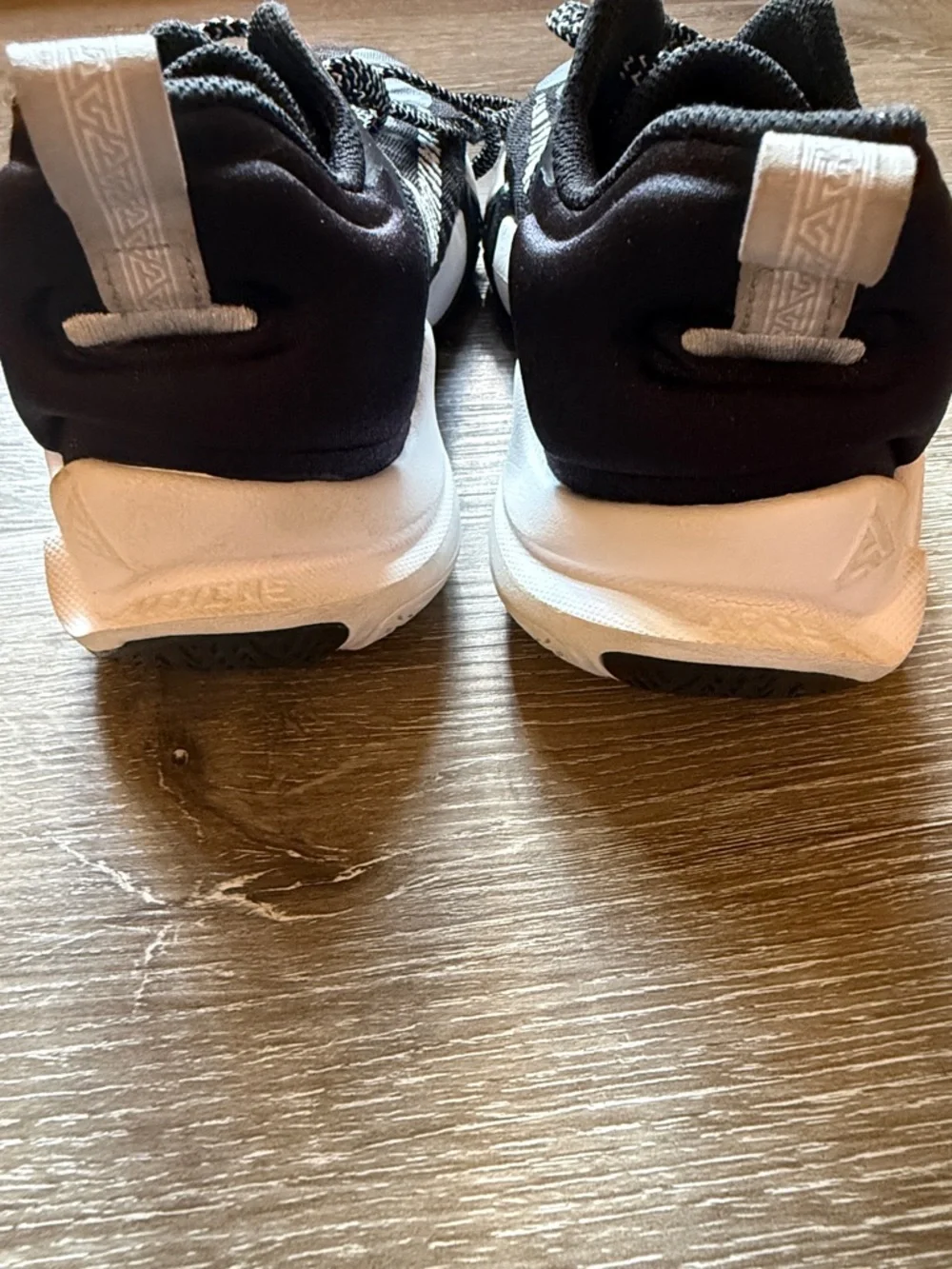 Nike Black and White Running Shoes with Lime Swoosh Accents